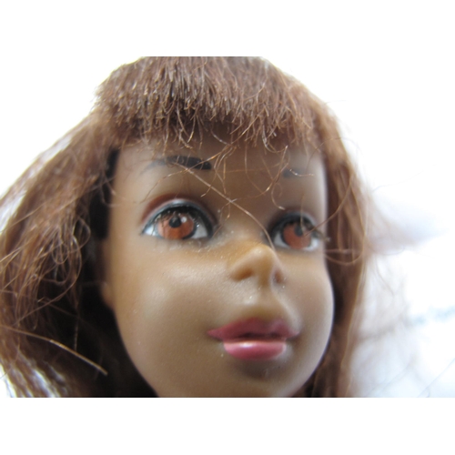 762 - A Black Francie Doll, slight loss of paint on eyebrow, outfit playworn, marked 1966 Mattel Made in J... 