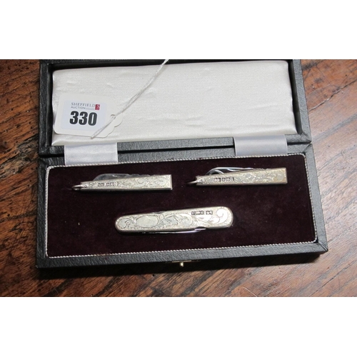 330 - Stan Shaw; A Royalty Set, comprising three knives - Princess Margaret with single blade and lanyard ... 