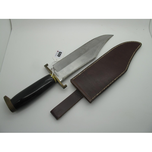 409 - A Bowie Knife, by Middleton, polished horn handle, brass pommel and guard, 39cm long in fitted brown... 