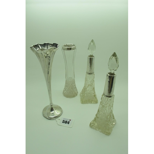 584 - A Pair of Cut Glass Scent Bottles, with faceted stoppers, a hallmarked silver rimmed cut glass spill... 