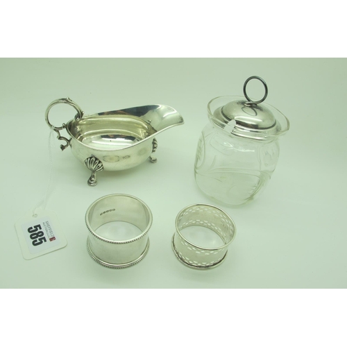 585 - A Hallmarked Silver Sauce Boat, Edward Barnard & Sons Ltd, London 1938, with leaf capped flying scro... 