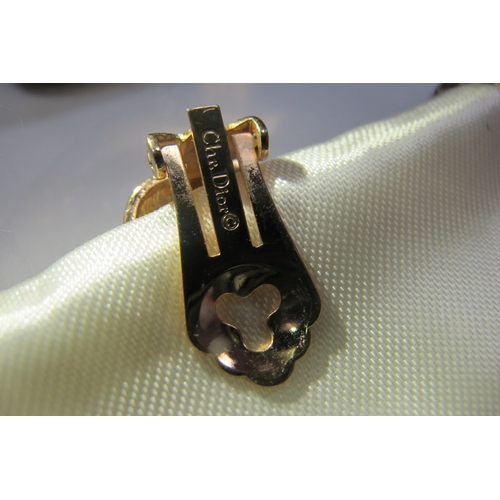 627 - Christian Dior; A Curb Link Necklace, with central rectangular cluster, clasp stamped 