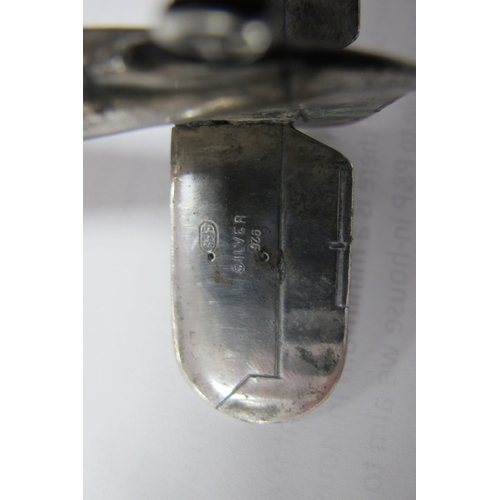 576 - A Novelty Model Aeroplane, articulated, stamped 