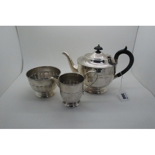 560 - A Hallmarked Silver Three Piece Tea Set, Sidney Hall & Co, Sheffield 1934, each of circular panelled... 