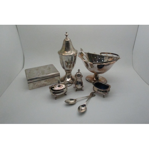 597 - A Hallmarked Silver Cigarette Box, together with a plated swung handled sugar basket, a plated cruet... 