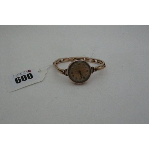 600 - A Vintage Ladies Wristwatch, the circular textured two tone dial with Arabic numerals, the movement ... 