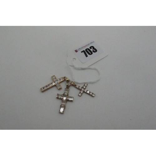 703 - Three Modern 9ct Gold Cross Pendants, claw and channel set (overall weight 6.9grams). (3)