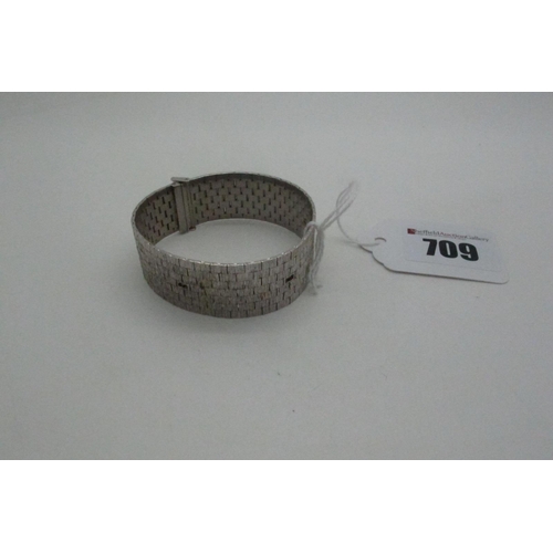 709 - A 9ct White Gold Bracelet, of uniform design, with bark textured finish, 16cm long (38grams).