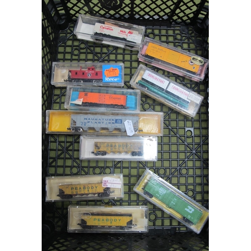 235 - Ten 'N' Gauge Cased U.S.A Outline Items, rolling stock, box vans, hoppers, caboose, various liveries... 