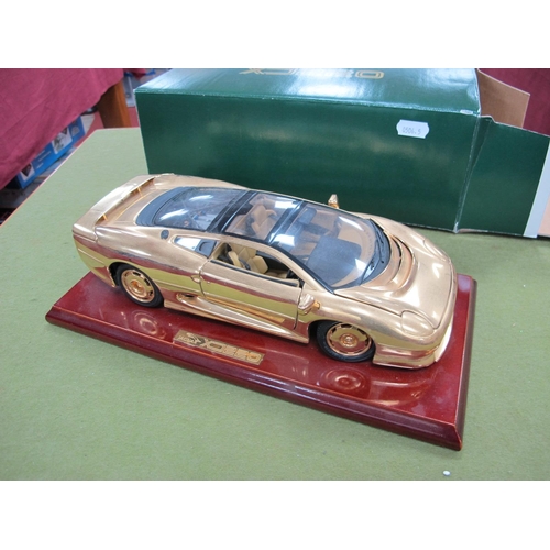 367 - A Boxed Gwilo 1:18th Scale Diecast Model XJ220, Gold Plated Finish, mounted on a wooden plinth, acco... 