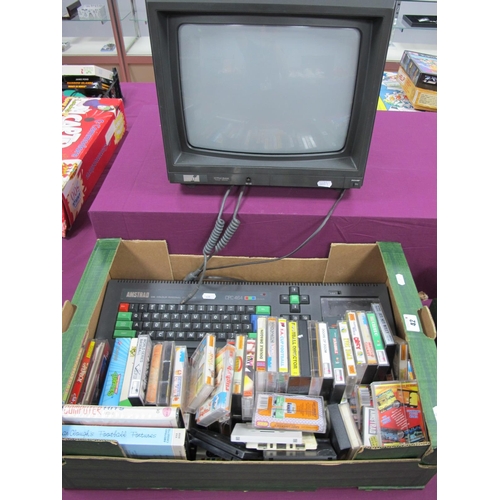 42 - An Amstrad CPC 464 64K Colour Personal Computer,  Amstrad CTM 644 Colour Monitor, plus a quantity of... 