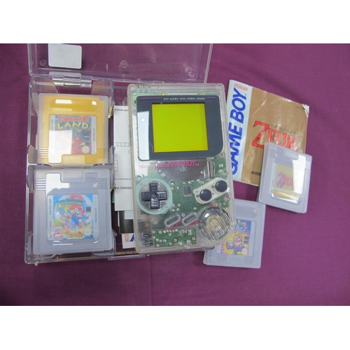 46 - A Nintendo Game Boy, (model No. DMG-01) transparent/clear case, four games including Super Mario Lan... 