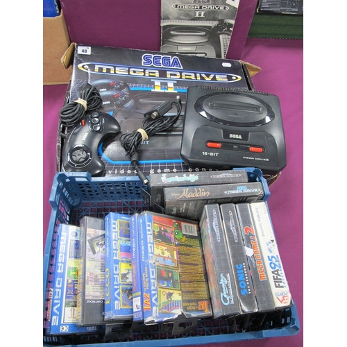 48 - A Boxed Sega Mega Drive II, 16 Bit Video Console, (untested) one control pad, eleven games cartridge... 