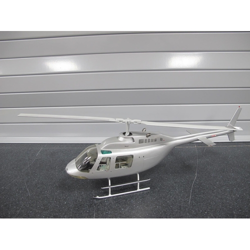 542 - A Model of a Bell 206 Jet Ranger Helicopter, by Executive Helicopter Models (England), 43cm long, bo... 