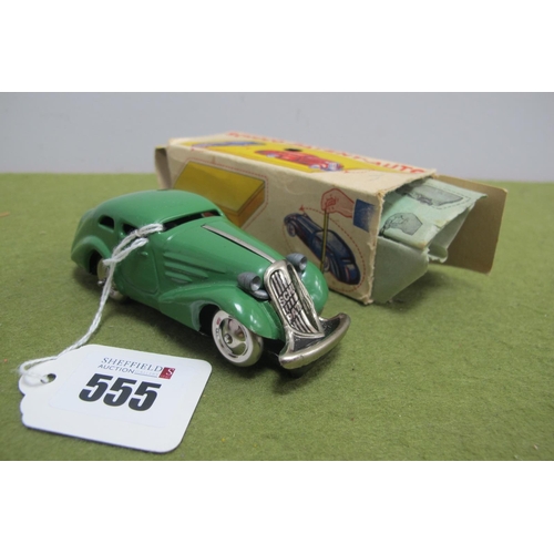 555 - A Schuco Patent Auto Clockwork Saloon No. 1001, green bodywork, paper present, no key, box fair.