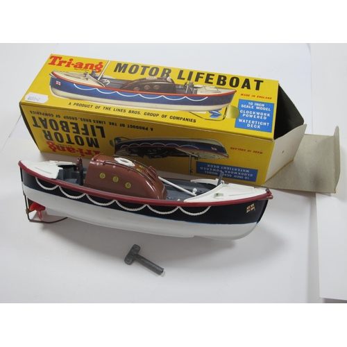 96 - A Tri-ang Plastic Model 10inch Scale Clockwork Powered Motor Lifeboat, mast and original key present... 