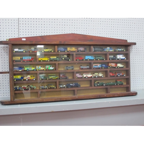 1 - A Wooden Framed Glass Fronted Diecast Model Vehicle Display Cabinet, containing forty plus modern di... 