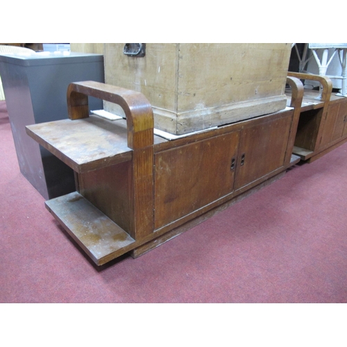 1559 - A XX Century Oak Window Seat, with arched arm supports, sold seats, cupboard doors, 136cm wide x 56c... 