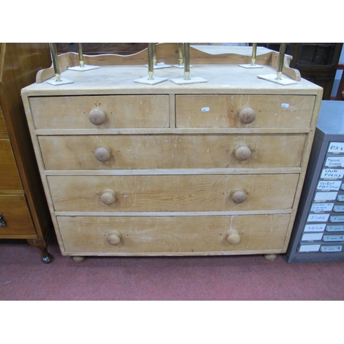 1576 - A XIX Century Pine Chest of Drawers, with ¾ gallery two short, three long drawers, on bun feet.