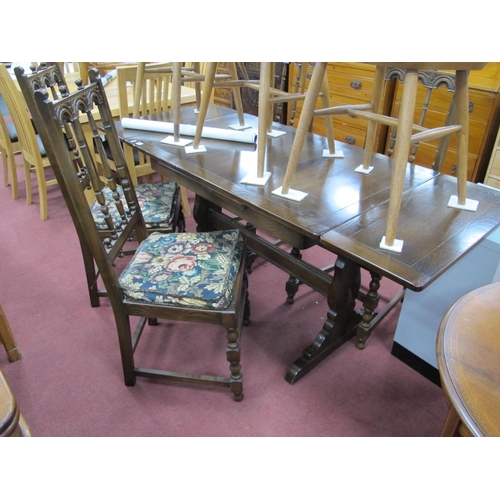 1591 - Ercol Dark Wood Draw Leaf Dining Table and Four Spindle Back Chairs.