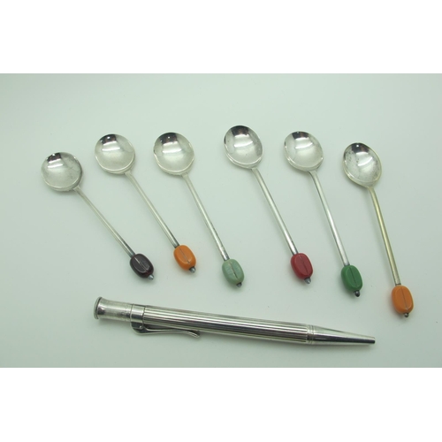 112 - A 'Graf Von Faber Castell' Pen, of engine turned design; together with a set of six harlequin coffee... 