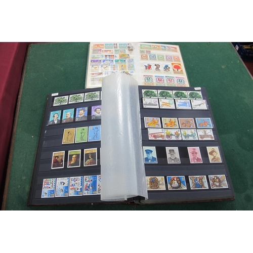 566 - A Collection of Mint G.B Stamps, from Pre-Decimal QEII to Decimal 1999, hosed in a red stockbook, to... 