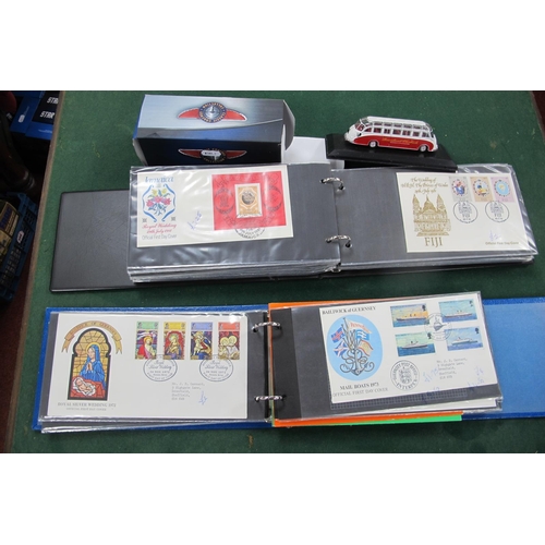 624 - A Collection of Guernsey FDC's and Presentation Packs, with values to £1 and a collection of Charles... 