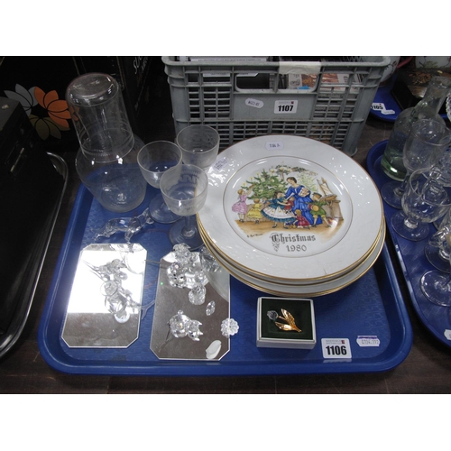 1106 - Swarovski Figures, (faults noted) and brooch, Worcester Christmas plates, glassware:- One Tray.