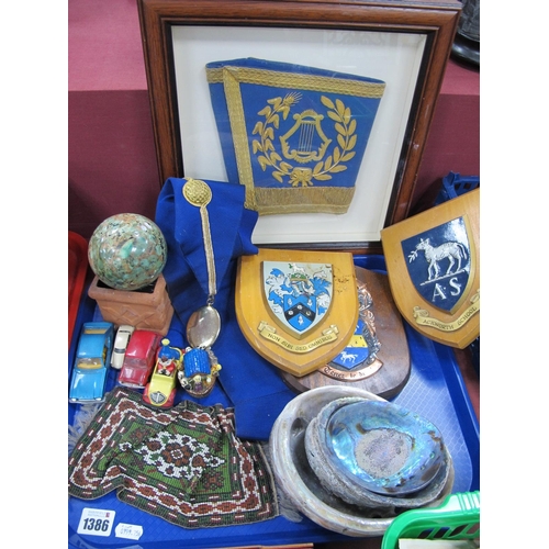 1386 - Three Heraldic Crests, seashells, model die cast vehicles, beaded rug, model, etc: One Tray, framed ... 