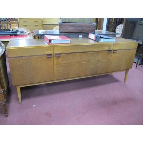 1625 - Nathan Teak Sideboard, circa 1970's, with cupboards flanking three drawers, on tapering legs, 183.5c... 