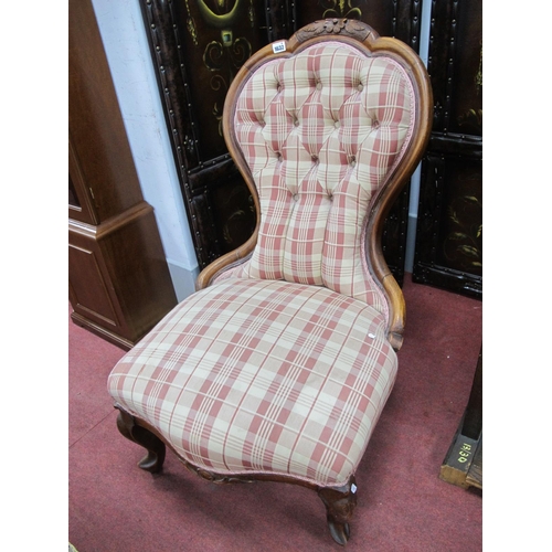 1632 - A Walnut Framed Spoon Back Chair, with carved cresting, re upholstered in a button back check fabric... 