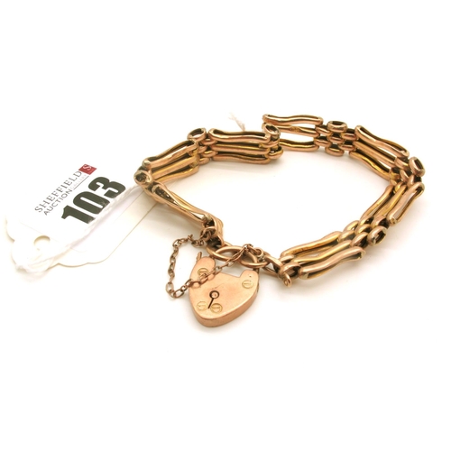 103 - A Gate Link Style Bracelet, (indistinctly stamped, to a heart shape padlock style clasp, stamped 