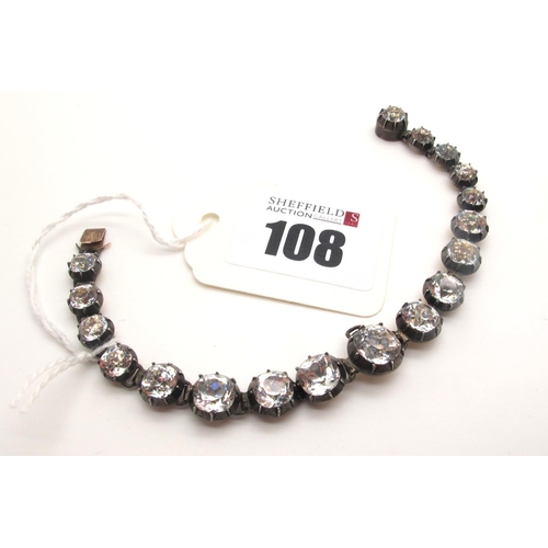 108 - A XIX Century Colourless Paste Set Line Bracelet, the graduated cushion shape colourless paste colle... 