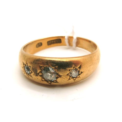 122 - An Antique Three Stone Diamond Ring, graduated star set with three old cut stones, stamped 