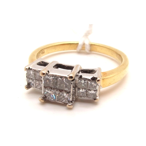 131 - A Modern 18ct Gold Princess Cut Diamond Set Ring, claw set with graduated stones, stamped 