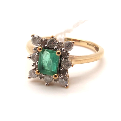 132 - A 9ct Gold Emerald and Diamond Custer Ring, rectangular four claw set to the centre, within border o... 