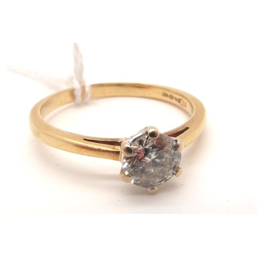 139 - An 18ct Gold Single Stone Diamond Ring, the brilliant cut stone claw set between plain shoulders (fi... 