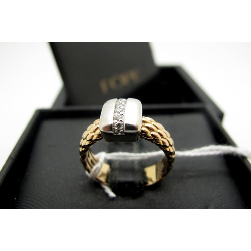 142 - Fope; A Modern Italian Diamond Set Ring, of two tone textured finish, inset with uniform brilliant c... 