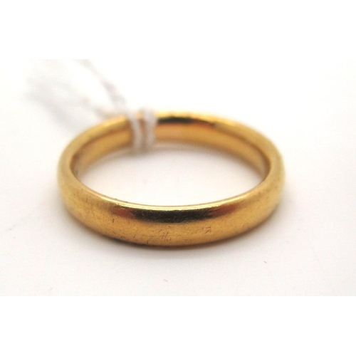 143 - A 22ct Gold Plain Wedding Band, (finger size L) (4.5grams).