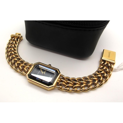 155 - Chanel; A 1980's Premiere Gold Plated Ladies Dress Wristwatch, the signed black rectangular dial wit... 