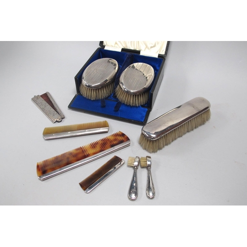 32 - A Pair of Hallmarked Silver Backed Brushes, Chester 1920, in a fitted case; A Further Hallmarked Sil... 