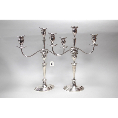 40 - A Pair of Hallmarked Silver and Silver Plated Twin Branch Candelabra, the candlesticks of tapering d... 