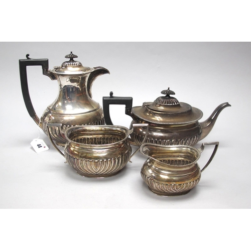 44 - A Hallmarked Silver Four Piece Tea Set, CB&S, Sheffield 1938 of oval semi gadrooned form (overall we... 