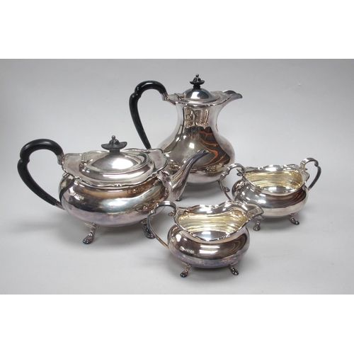 49 - A Hallmarked Silver Four Piece Tea Set, HA, Sheffield 1929, each of plain oval form with shaped rim ... 