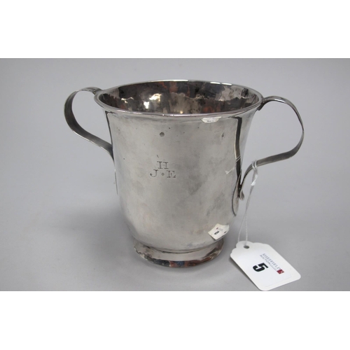 5 - An XVIII Century Twin Handled Porringer, (marks completely rubbed), of plain form, with twin loop ha... 