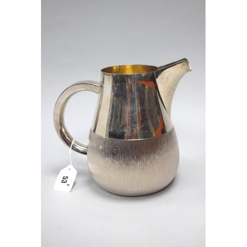 53 - Gerald Benney; A Hallmarked Silver Pitcher, AGB, London 1980, of baluster form, semi textured finish... 