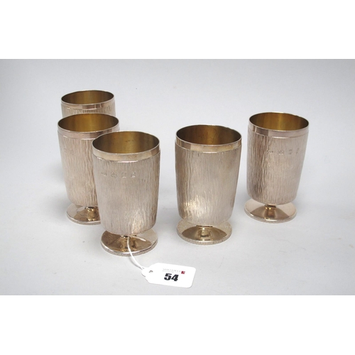 54 - Gerald Benney; A Matched Set of Five Hallmarked Silver Goblets, AGB, London 1969, 1970,each of textu... 