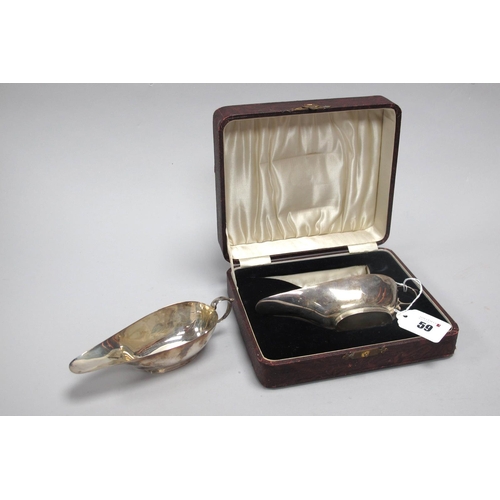 59 - A Stylish Pair of Hallmarked Silver Sauce Boats, S Blanckensee & Son Ltd, Birmingham 1931, each of p... 