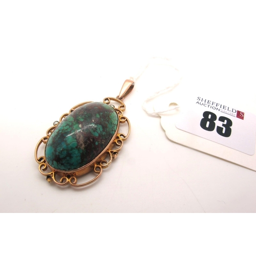 83 - A Turquoise Matrix Single Stone Pendant, oval collet set, within scroll mount highlighted with seed ... 