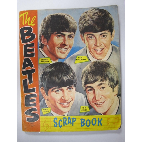 314 - Beatles Signatures, a scrapbook containing various images of the Fab Four, but the highlight is the ... 